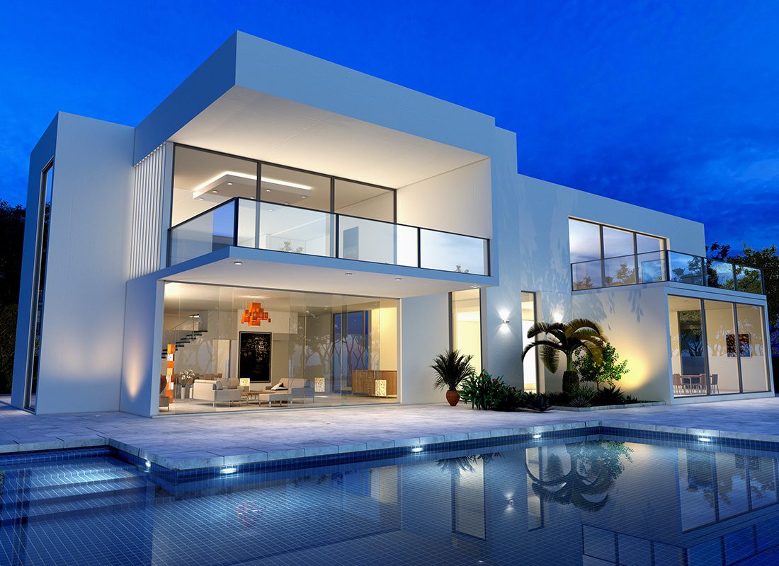 Personal Insurance - Luxury Home With Spacious Pool and Large Glass Doors and Windows During the Evening
